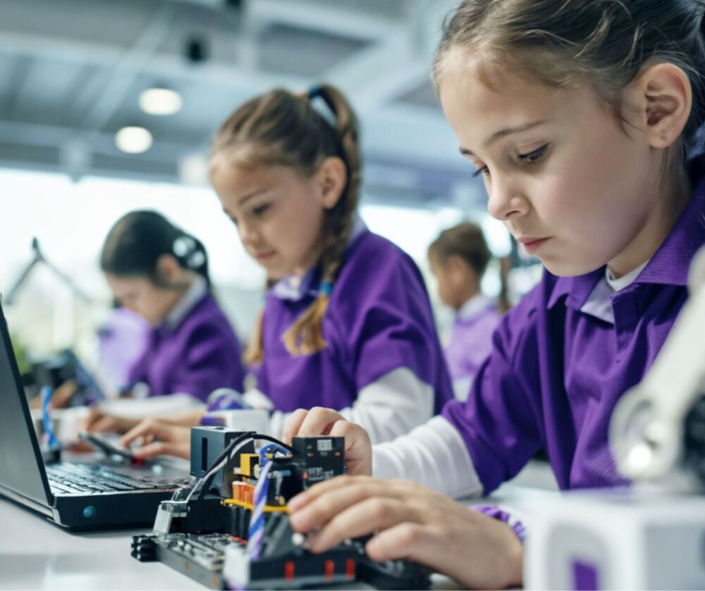 students working on electronics