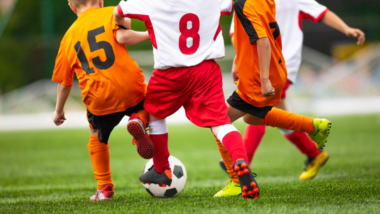 kids playing football